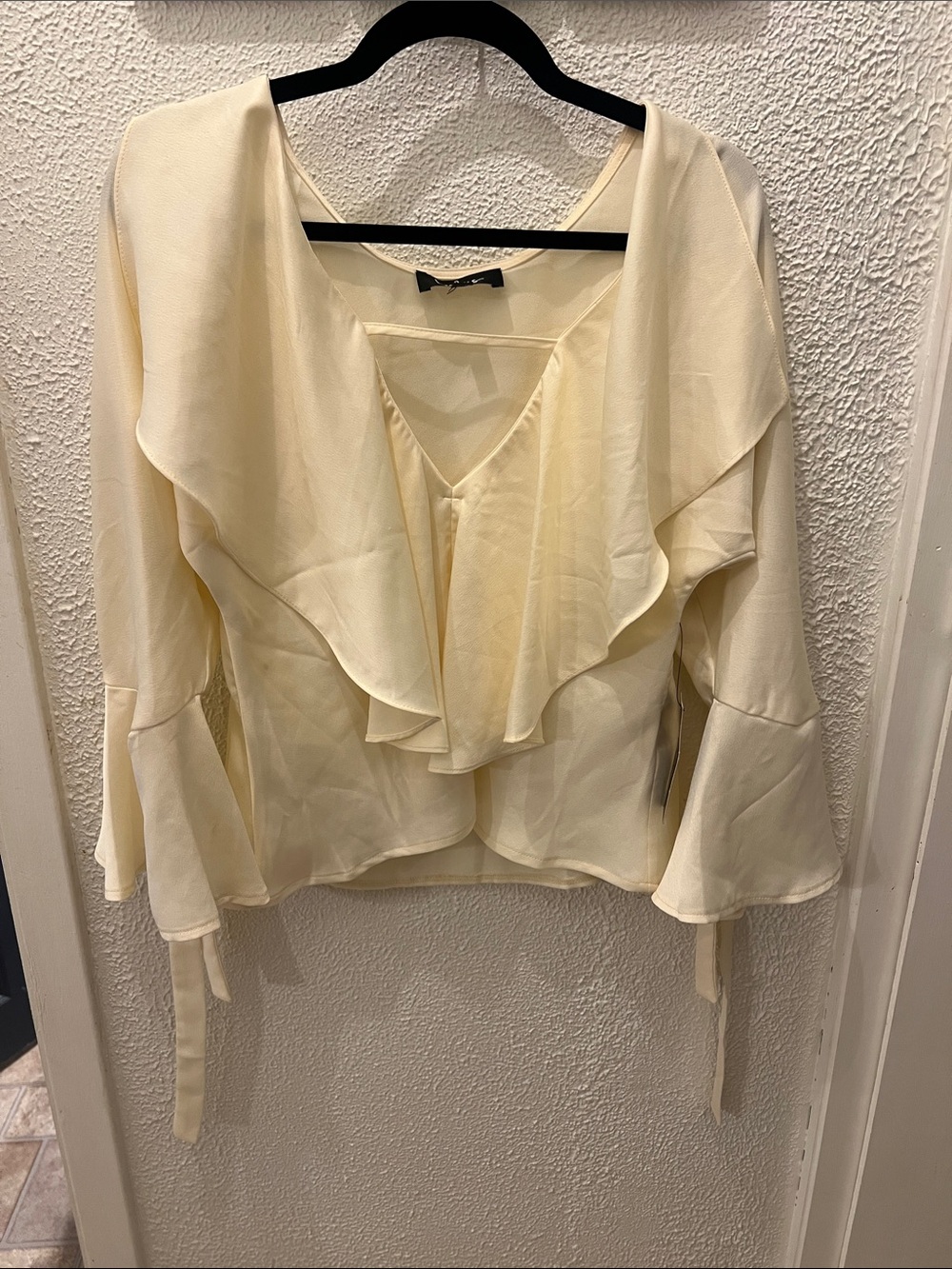 Lulu's Cream Ruffle V-Neck Blouse